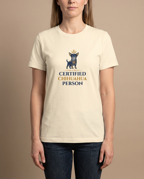 Woman wearing the Certified Chihuahua Person cream t-shirt, front view studio shot
