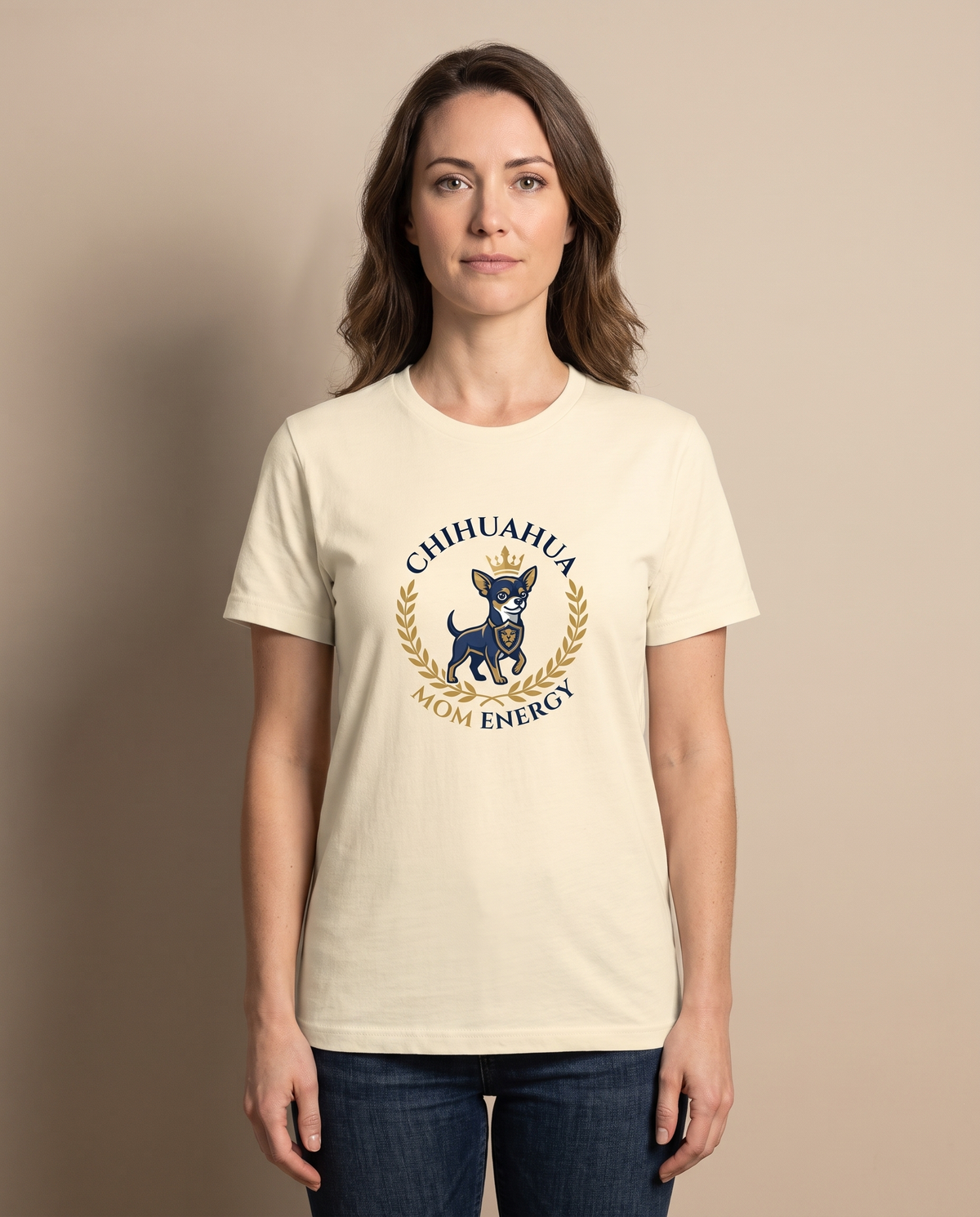 Woman wearing the Chihuahua Mom Energy cream t-shirt, front view studio shot
